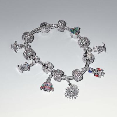 CHARM PANDORA CASSE -NOISETTE mobile